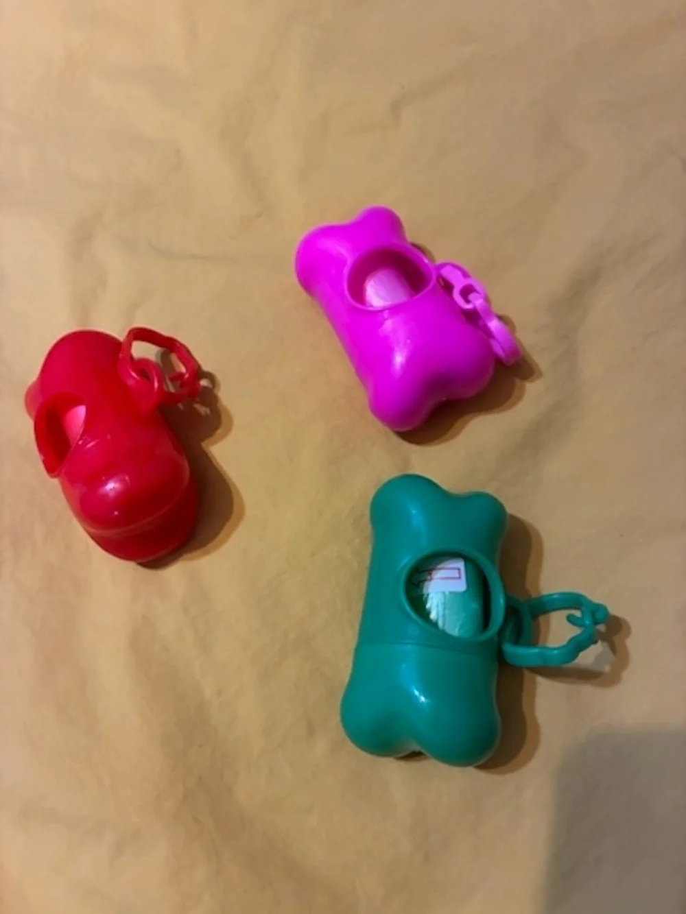 Universal Standard Pink, Red & Green Dog Waste Bag Dispensers